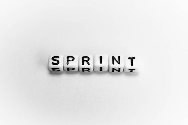 White cubes with word SPRINT on white background - Photo, Image
