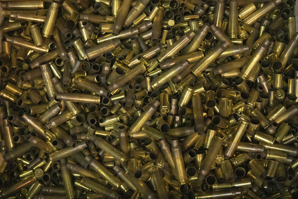 Different ammo bullet sleeves background - 写真・画像