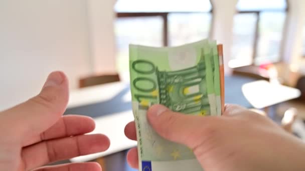 Man counting cash in 50 and 100 euro bank notes - Video, Çekim