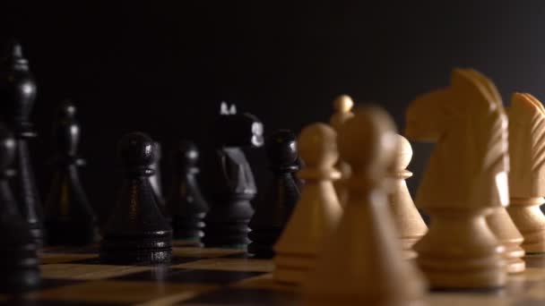 White and black pieces on chess board - Footage, Video