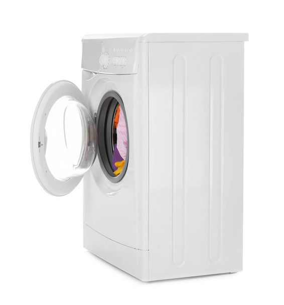 Modern washing machine with laundry isolated on white - 写真・画像