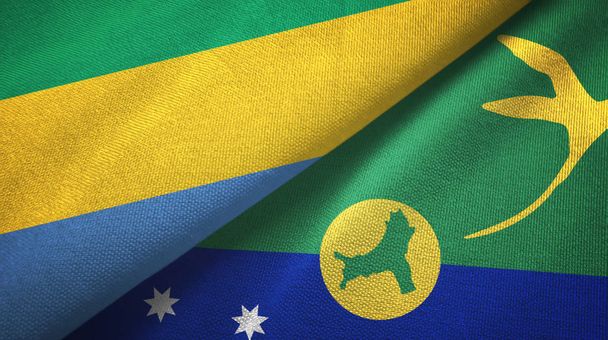 Gabon en Christmas Island twee vlaggen textiel doek, stof textuur - Foto, afbeelding