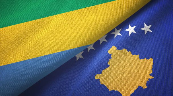 Gabon ja Kosovo kaksi lippua tekstiilikangas, kangas rakenne
 - Valokuva, kuva