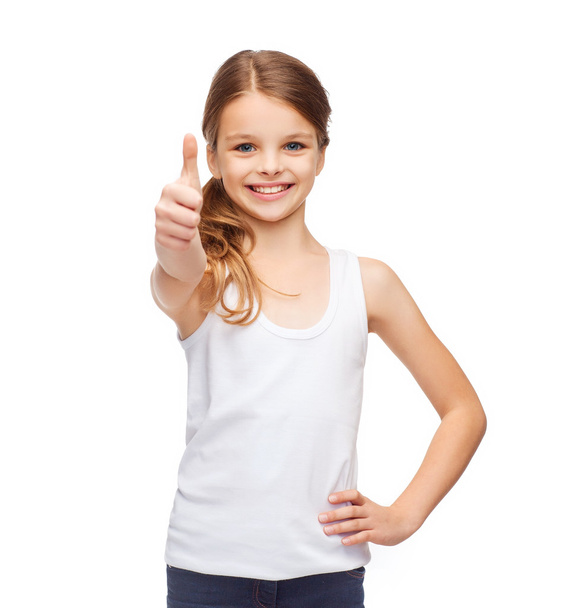 Girl in blank white shirt showing thumbs up - Фото, зображення