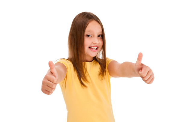 Young girl with thumbs up - 写真・画像