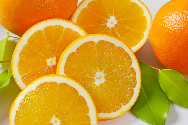 Свіжі апельсини скибочки
 - Фото, зображення
