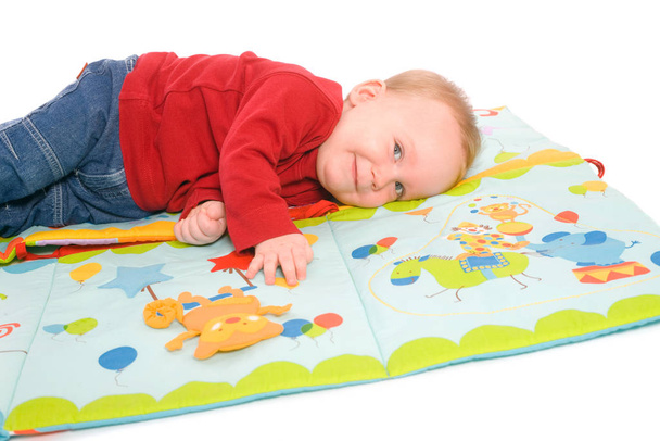 Baby boy playing with toys - Foto, Bild