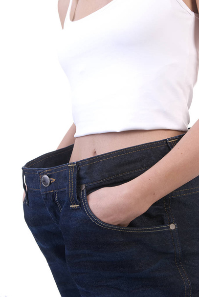 woman with too big trousers - Fotografie, Obrázek