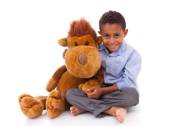 African American little boy holding a plush - Black people - Фото, изображение