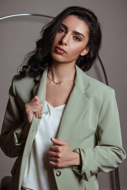 Beautiful young woman wearing blazer and blouse - Foto, afbeelding