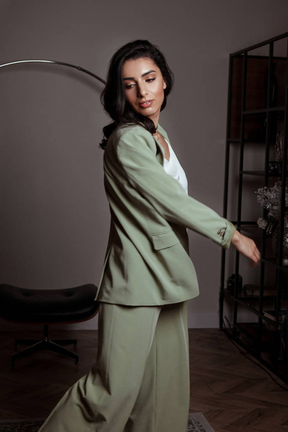 Beautiful young woman wearing blazer and blouse - Fotó, kép