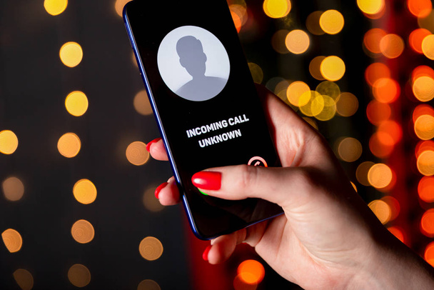 Phone call from unknown number. Scam, fraud or phishing with smartphone concept. Prank caller, scammer or stranger. Woman answering to incoming call. Hoax person with fake identity - Fotoğraf, Görsel