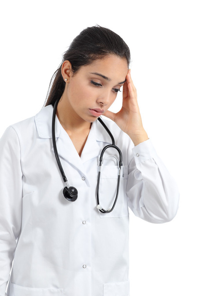 Female doctor tired with headache - Foto, imagen