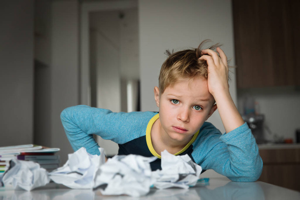 Child tired and bored of doing homework, kid stressed from learning - Photo, Image