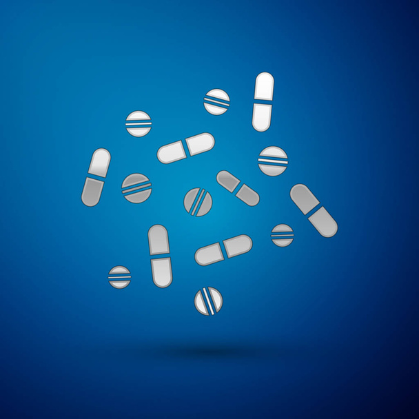 シルバーメディシンの丸薬やタブレットのアイコンは、青い背景に分離されています。カプセルピルと薬のサイン.薬局の設計。ベクトルイラストレーション - ベクター画像
