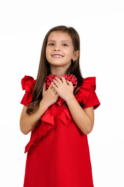 valentines day. smiling child girl with red heart - Φωτογραφία, εικόνα