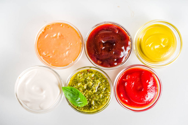 Set bowls of various dip and sauces - Foto, imagen