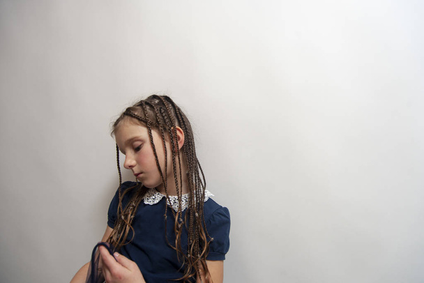 The white little girl with african braids. - Фото, зображення