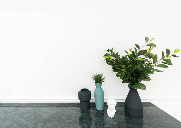 Living roon corner decorated with black matt ceramic  vase and artificial plant in vase on green marble top with white spray-painted wall in the background /apartment interior /object on white background - Photo, Image