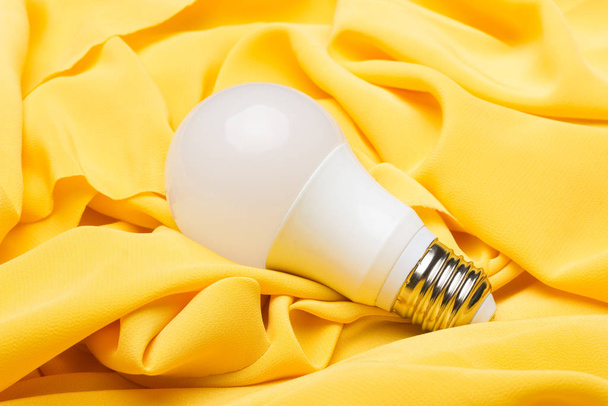 Energy saving light bulb and white light; home and work lighting. - Photo, Image