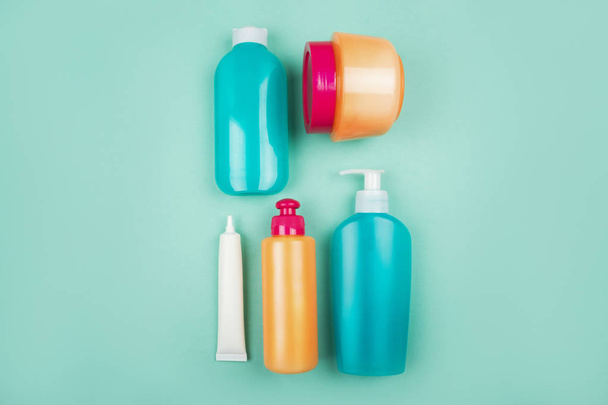 Flatlay with plastic bottles - Foto, imagen