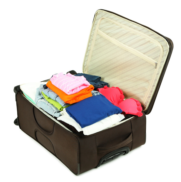 Suitcase with clothes isolated on white - Valokuva, kuva