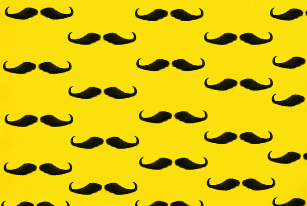 Black male mustache on a yellow background, illustration. - Photo, Image