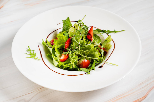 healthy salad with strawberriesa and arugula - Photo, image