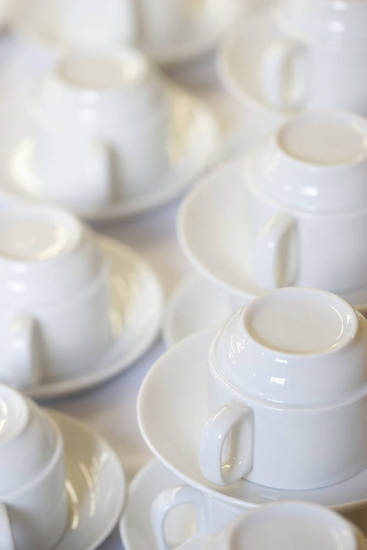 white cups on the table - Fotoğraf, Görsel