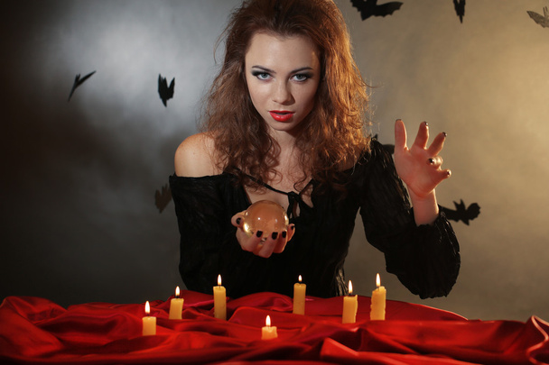 Halloween witch on dark background - Fotoğraf, Görsel