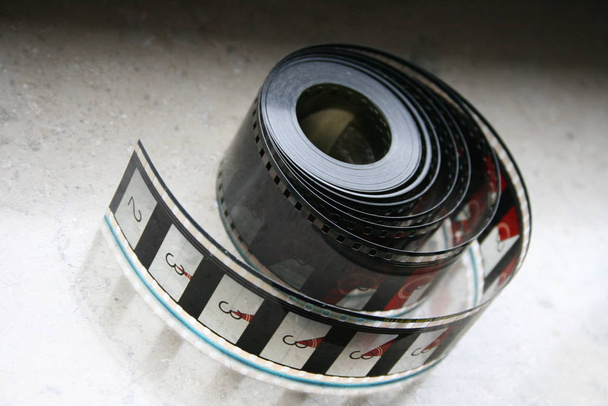 old camera on a black background - Фото, изображение