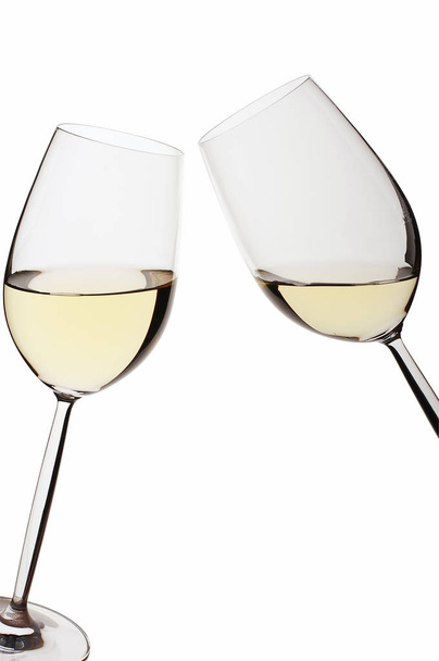 Pair of isolated white wine glasses on white bacground - Foto, imagen