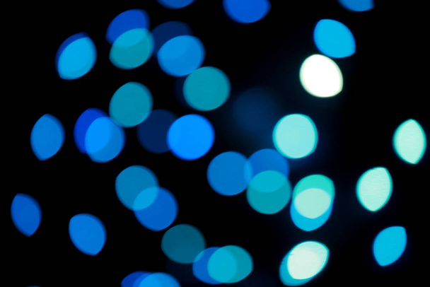 Defocused blue Christmas lights, as holiday background - Foto, Imagem