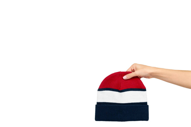 Striped cotton hat. Winter season apparel, cport wear. - Photo, Image