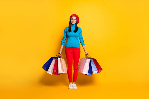 Full length body size view of her she nice attractive cheerful cheery fashionable girl having fun visiting store enjoying new season sale isolated on bright vivid shine vibrant yellow color background - Foto, Imagem