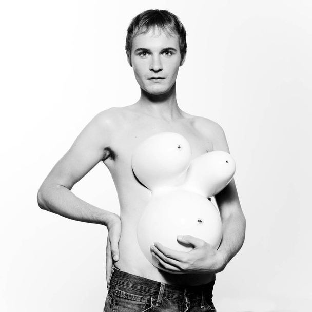 portrait on isolated background of a pregnant young man - Foto, Bild