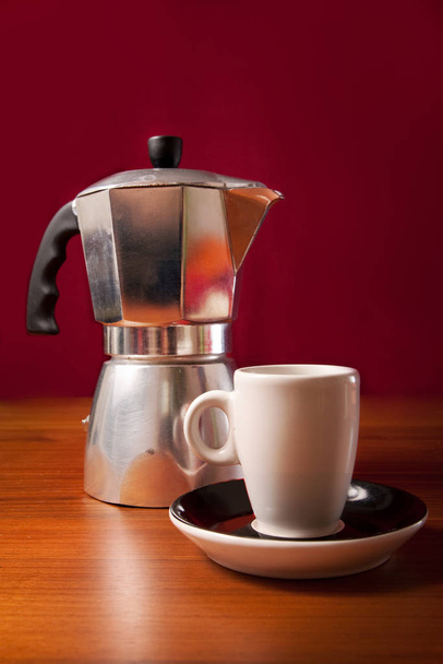 espresso cup and coffee percolator - 写真・画像