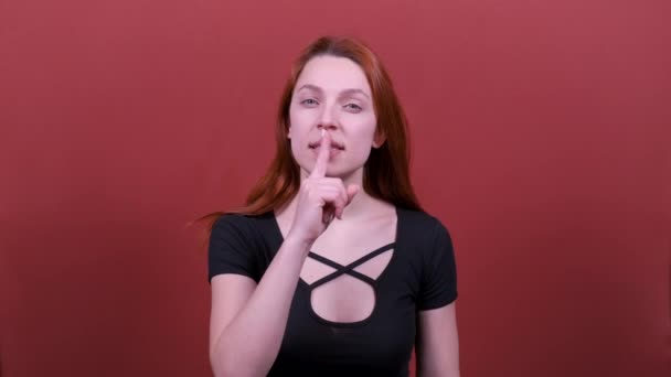 Look at camera say hush be quiet with finger on lips shhh gesture. People sincere emotions, lifestyle concept. - Кадры, видео
