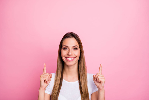 Portrait of positive cool girl point index finger up copyspace suggest select adverts promo wear casual style clothes isolated over pastel color background - Foto, imagen