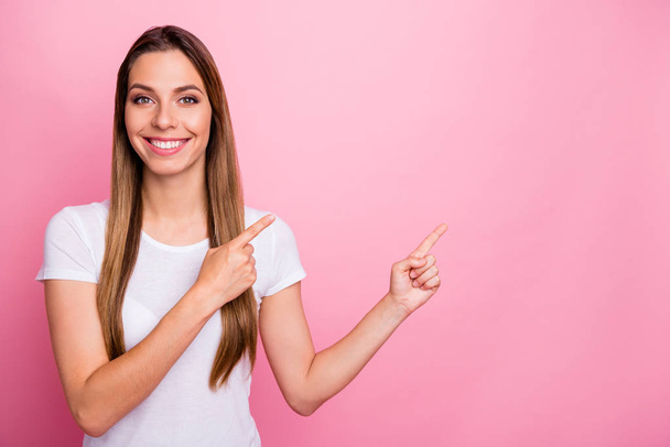 Portrait of positive cool girl point index finger copyspace present adverts information suggest select wear modern trendy outfit isolated over pastel color background - Foto, immagini