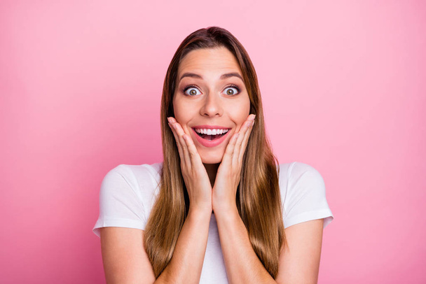 Close up photo of impressed enthusiastic girl hear wonderful black friday sales news touch face hands shout wear good looking clothes isolated over pink color background - Foto, Bild