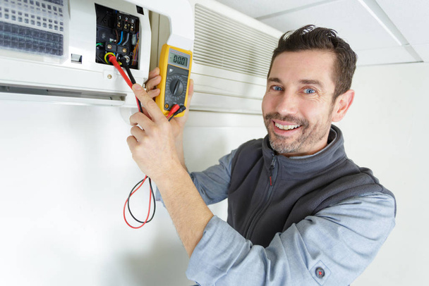 portrait of an air conditioning technician - Фото, изображение