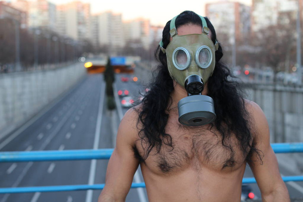 Man living in very polluted urban environment - Photo, Image