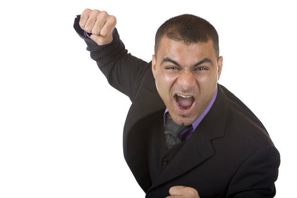 Stressed Businessman is angry and shows fists - Фото, изображение