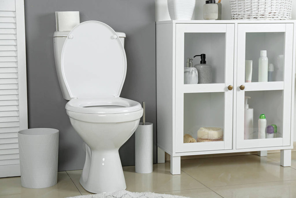 Stylish toilet bowl in modern bathroom interior - Foto, Imagen