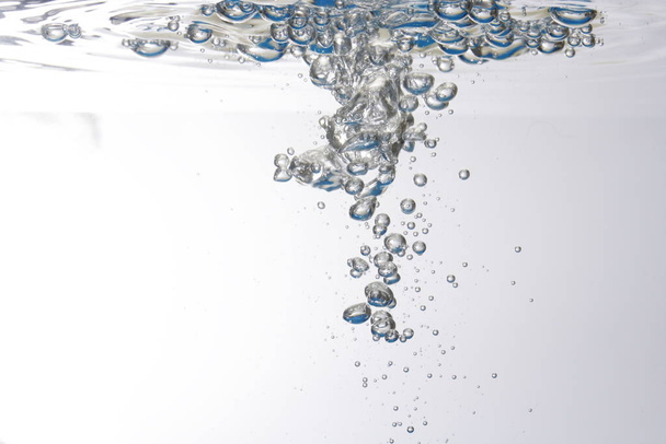 water splash on white background - Фото, изображение
