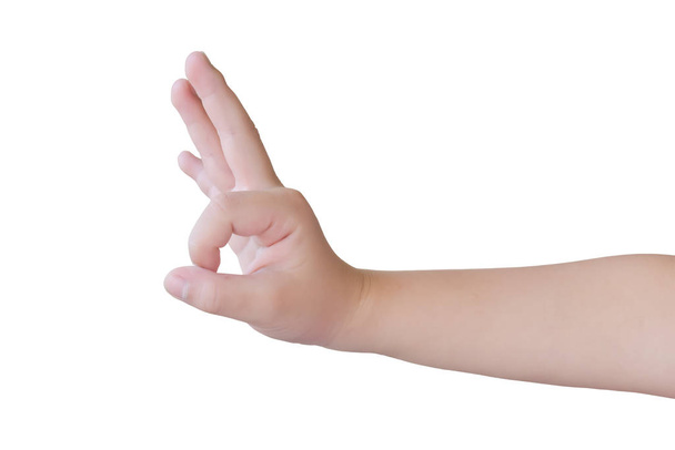 Child hand show making is OK, isolated on white background. with clipping path. - Foto, afbeelding