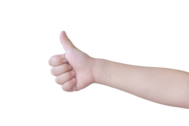 Παιδικό χέρι με τον αντίχειρα απομονωμένο σε λευκό φόντο. με διαδρομή αποκοπής. - Φωτογραφία, εικόνα