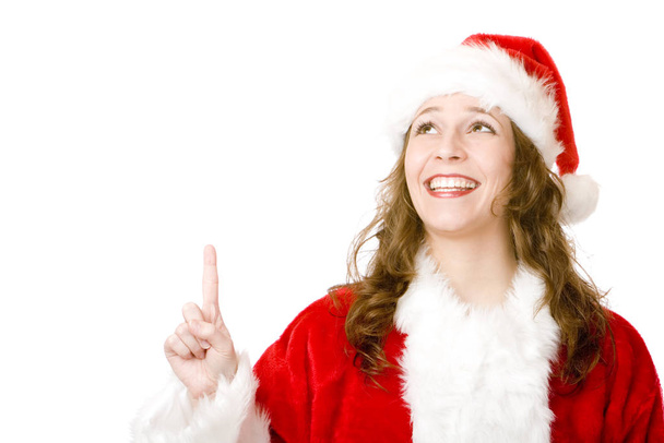 Happy smiling Santa Claus Woman pointing with finger up - Φωτογραφία, εικόνα