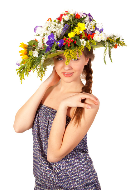 Beautiful girl with hat of flowers - Photo, image